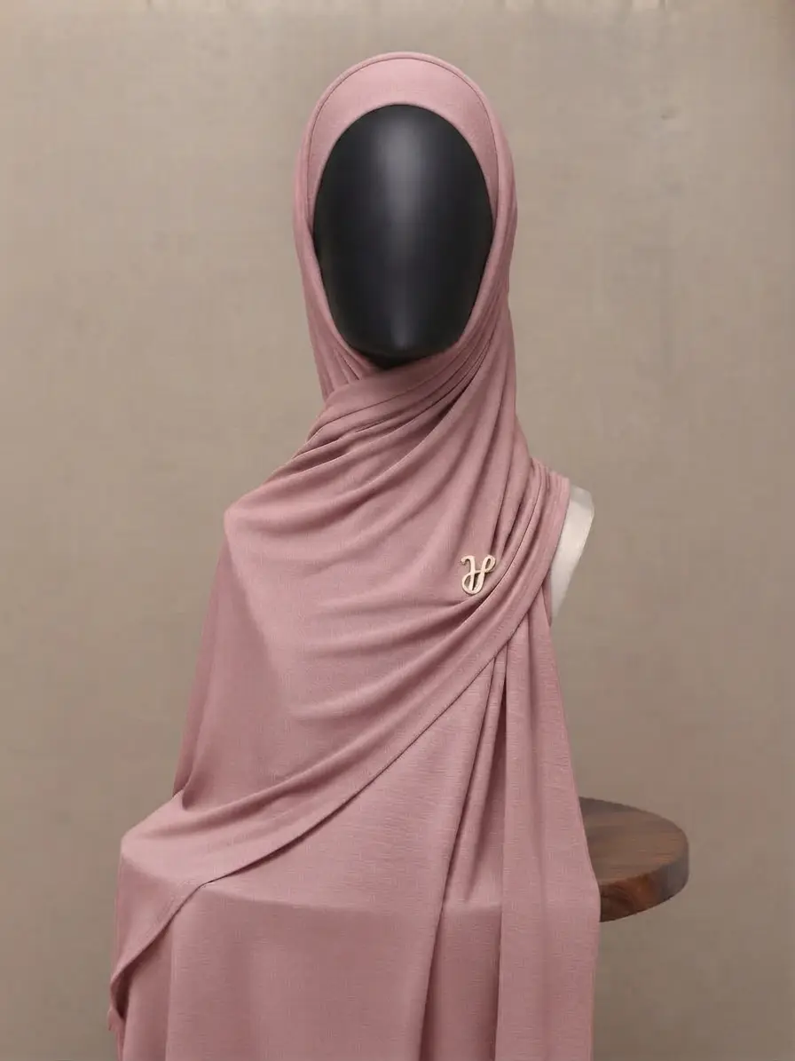 Dusty rose muted pink premium cotton jersey hijab with signature gold charm
