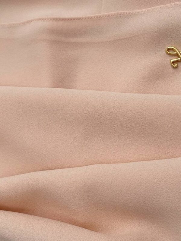 Soft blush pink premium chiffon hijab fabric close-up showing light texture and drape