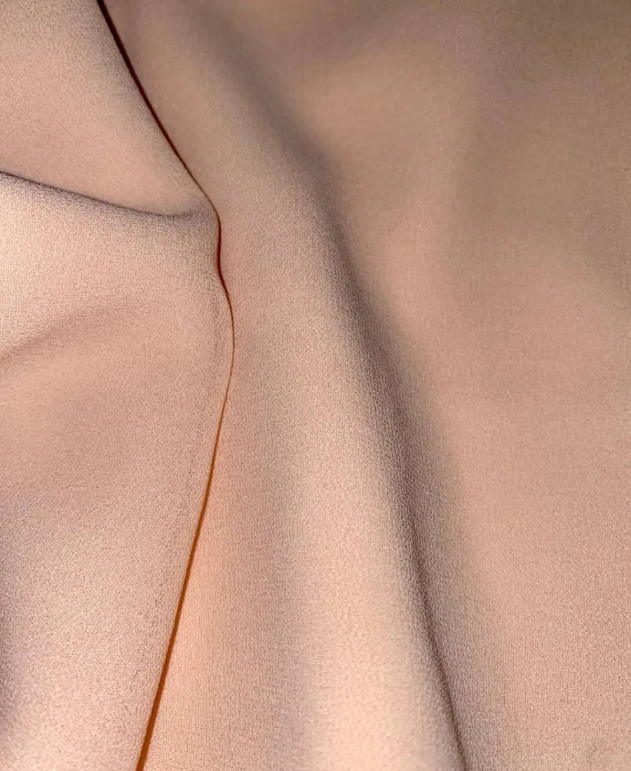 Soft blush pink premium chiffon hijab fabric close-up showing light texture and drape