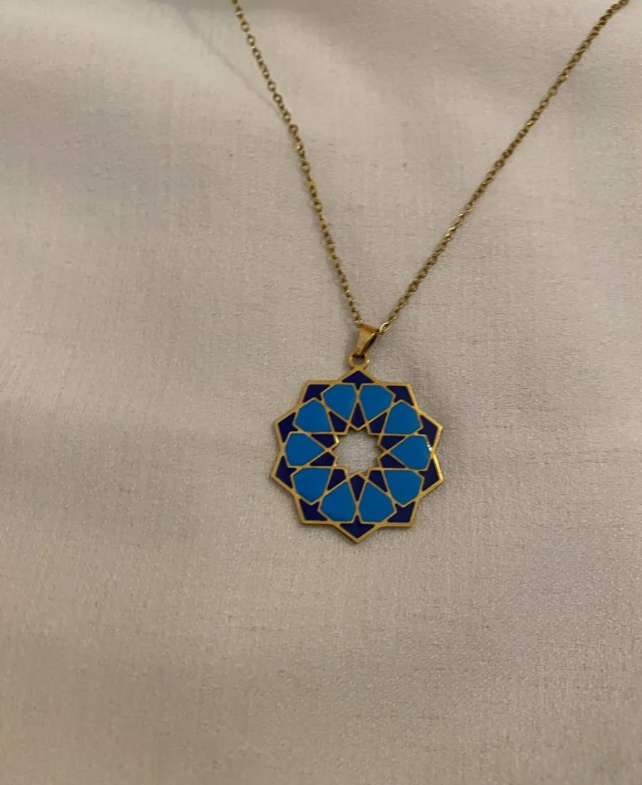 Handcrafted Mediterranean geometric rosette tile pendant necklace with blue and navy enamel in gold plating