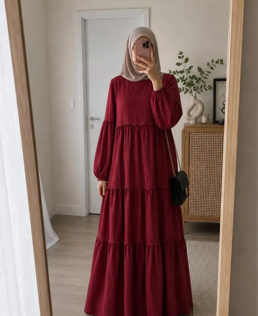 Crimson red rayon-linen dress displayed against a minimal background, showing soft texture and cotton lining detail.
