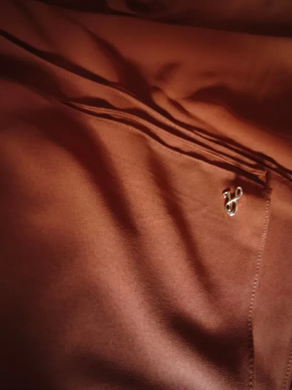 Rich khaki premium chiffon hijab with signature gold charm
